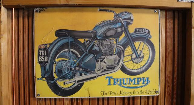 Triumph Sign