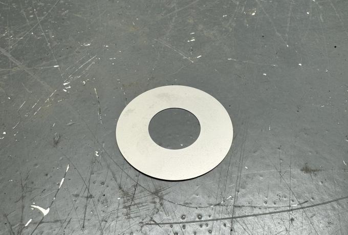 Crankcase oil retaining shim