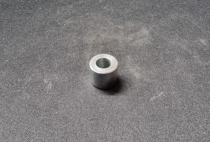 Triumph Spacer. Torque stay to frame. 