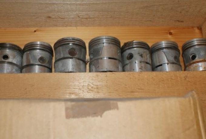 Car Pistons in their Boxes