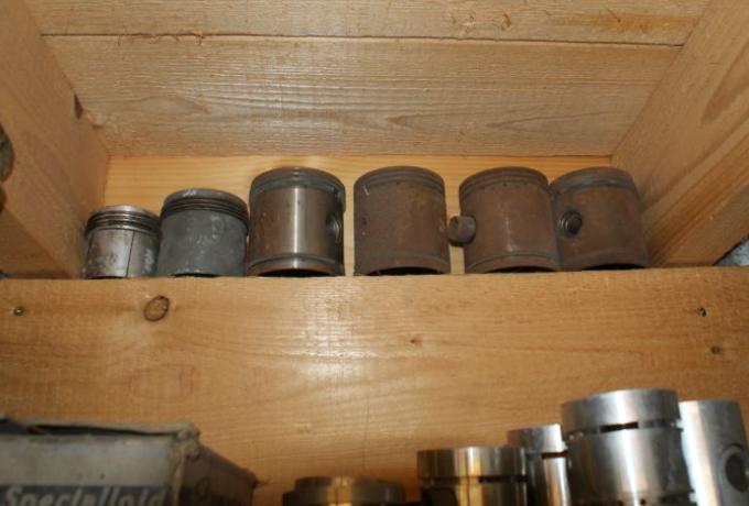 Car Pistons in their Boxes